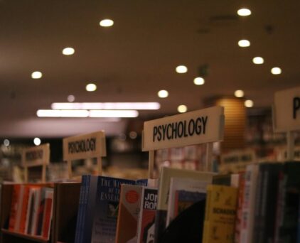 Psychology section in library by Alicia Christin Gerald