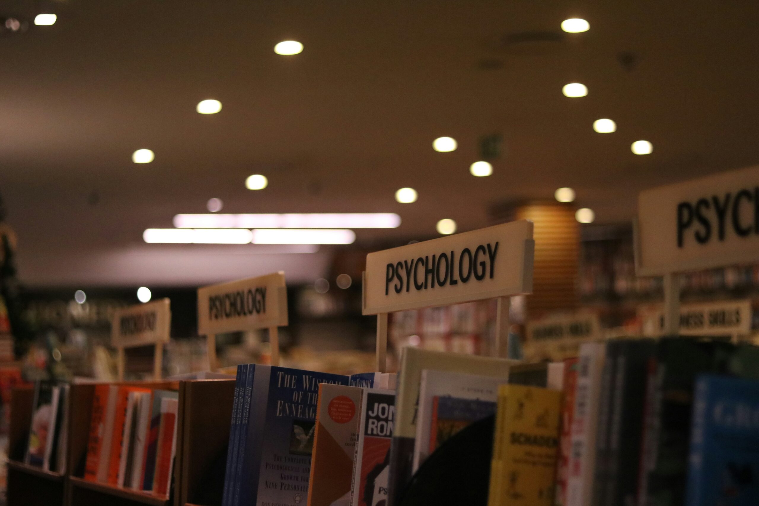 Psychology section in library by Alicia Christin Gerald