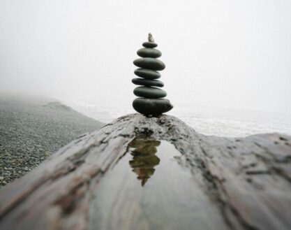 Balancing rocks at the beach by Karsten Winegeart